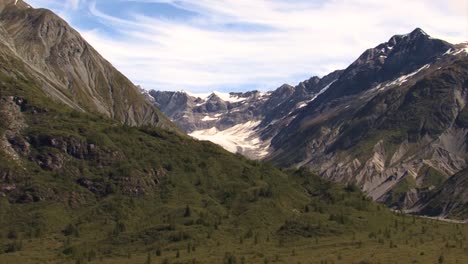 glacier between the mountains of alaska