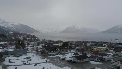 Business-Buildings-In-The-Snowy-Town-Of-Kafjord-In-The-Olderdalen-Valley-Along-Kafjorden-On-A-Foggy-Winter-Day-In-Norway