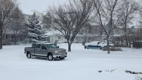 pickup truck on snowy road in swift current in saskatchewan, canada