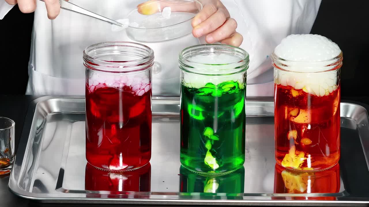 Creating foam with dry ice and colored liquids