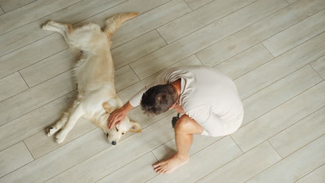 man and dog relaxing together