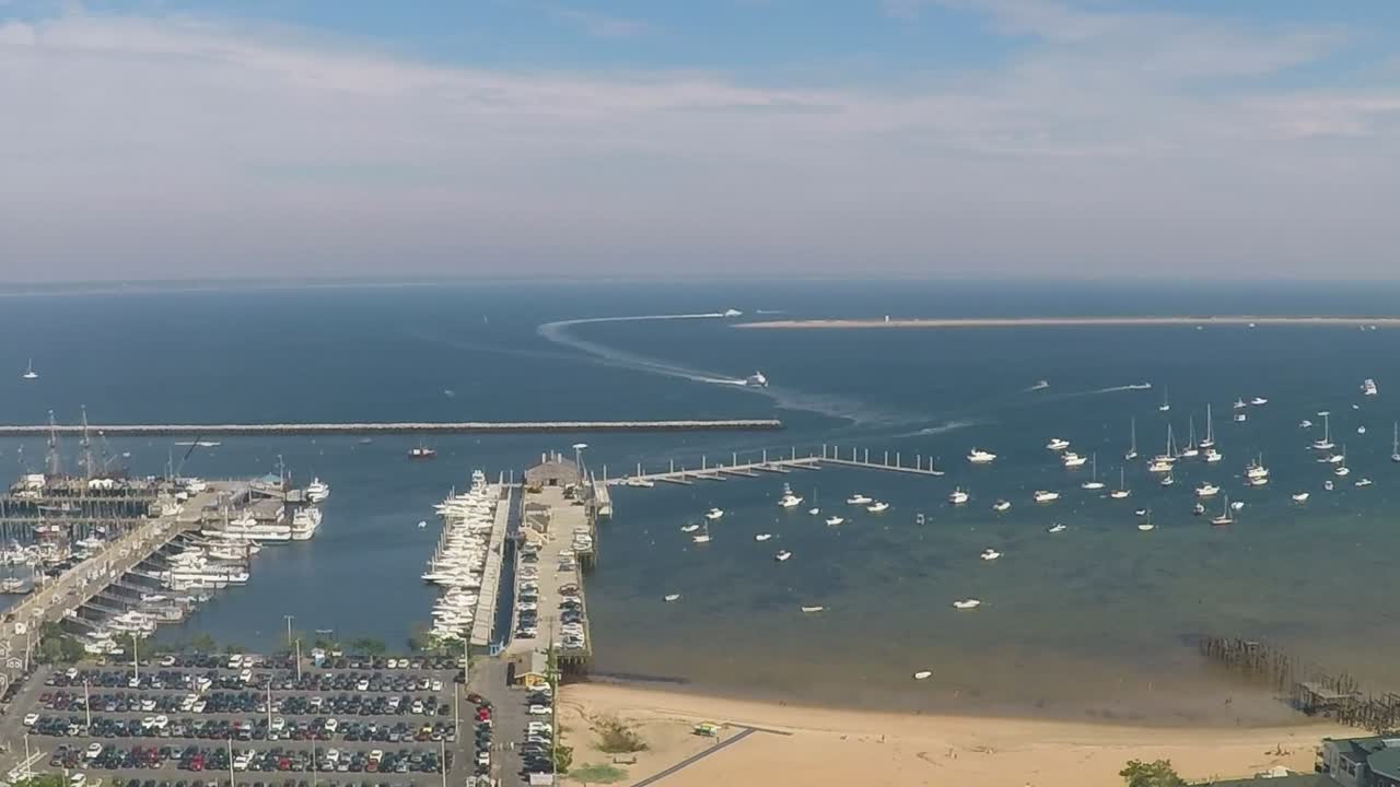 Time lapse view of a harbor with ferries moving in and out