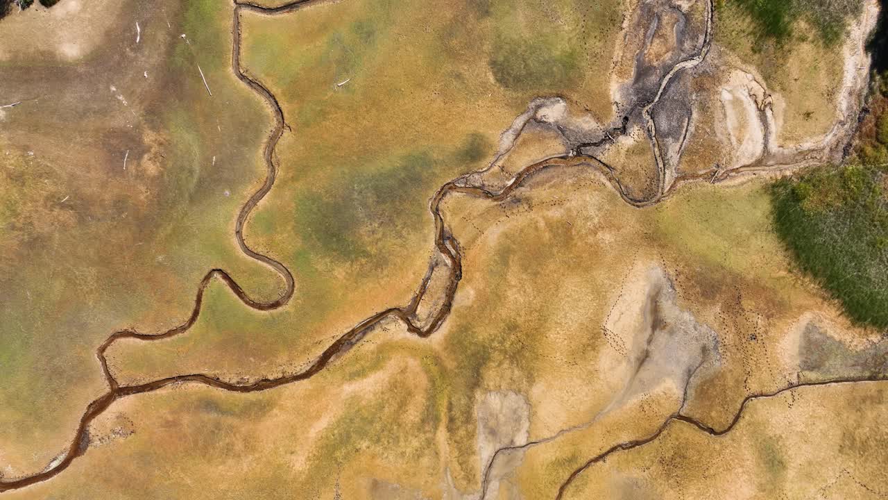 Aerial fly Textured Water slope, river through untouched national park at Montenegro, Biogradska Gora