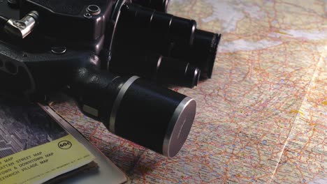vintage 8mm camera with travel road maps evoke nostalgic journeys