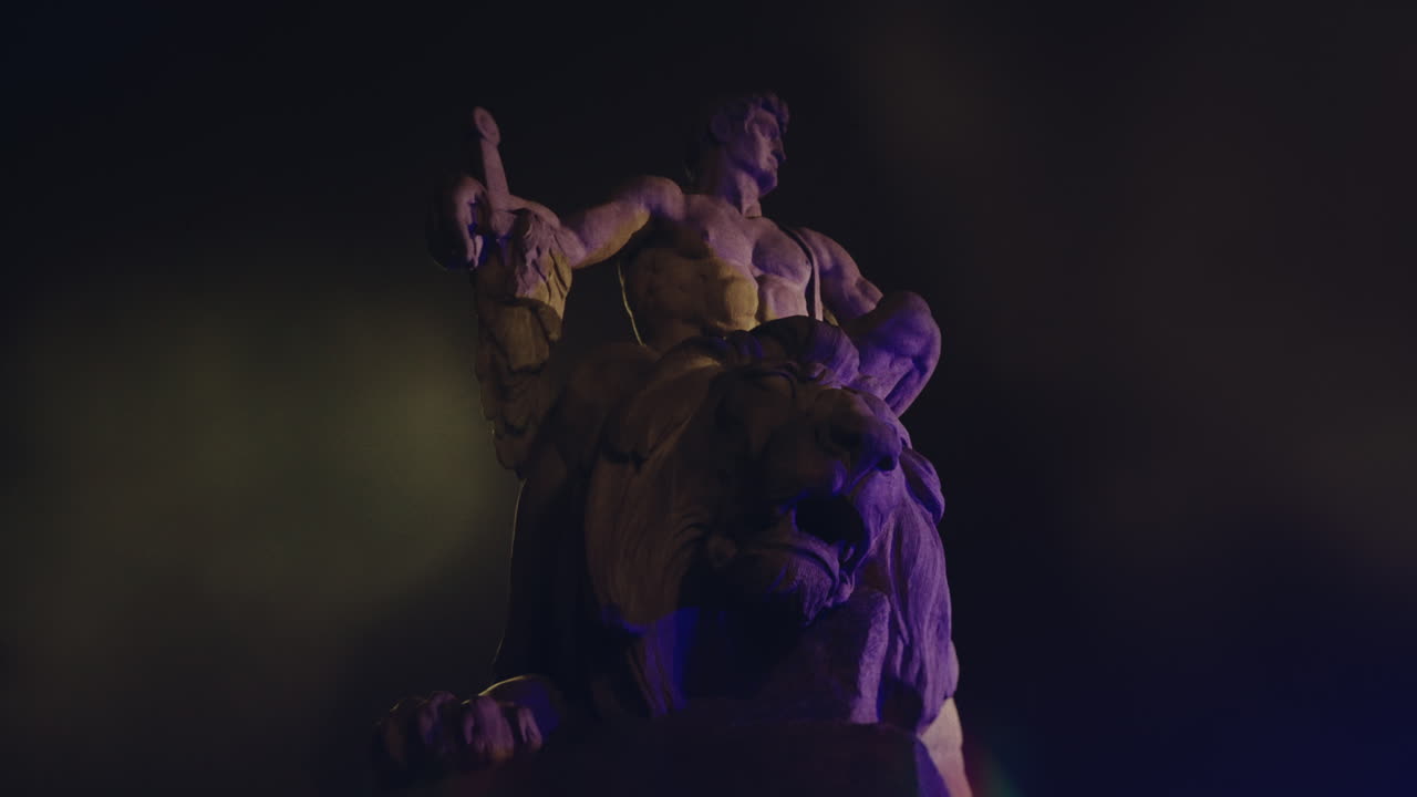 Epic, ancient stone statue at night