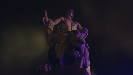 epic, ancient stone statue at night