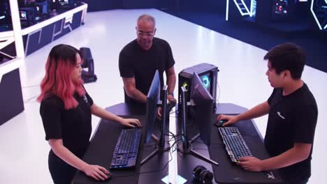 a collaborative tech session: engaging participants in a high-tech environment with multi-user interactions around advanced gaming stations