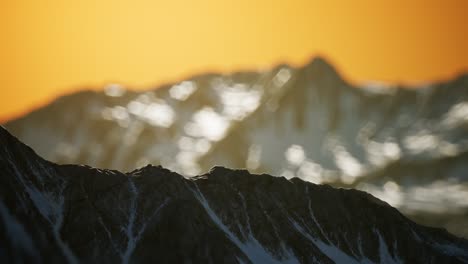 winter landscape in mountains at sunset