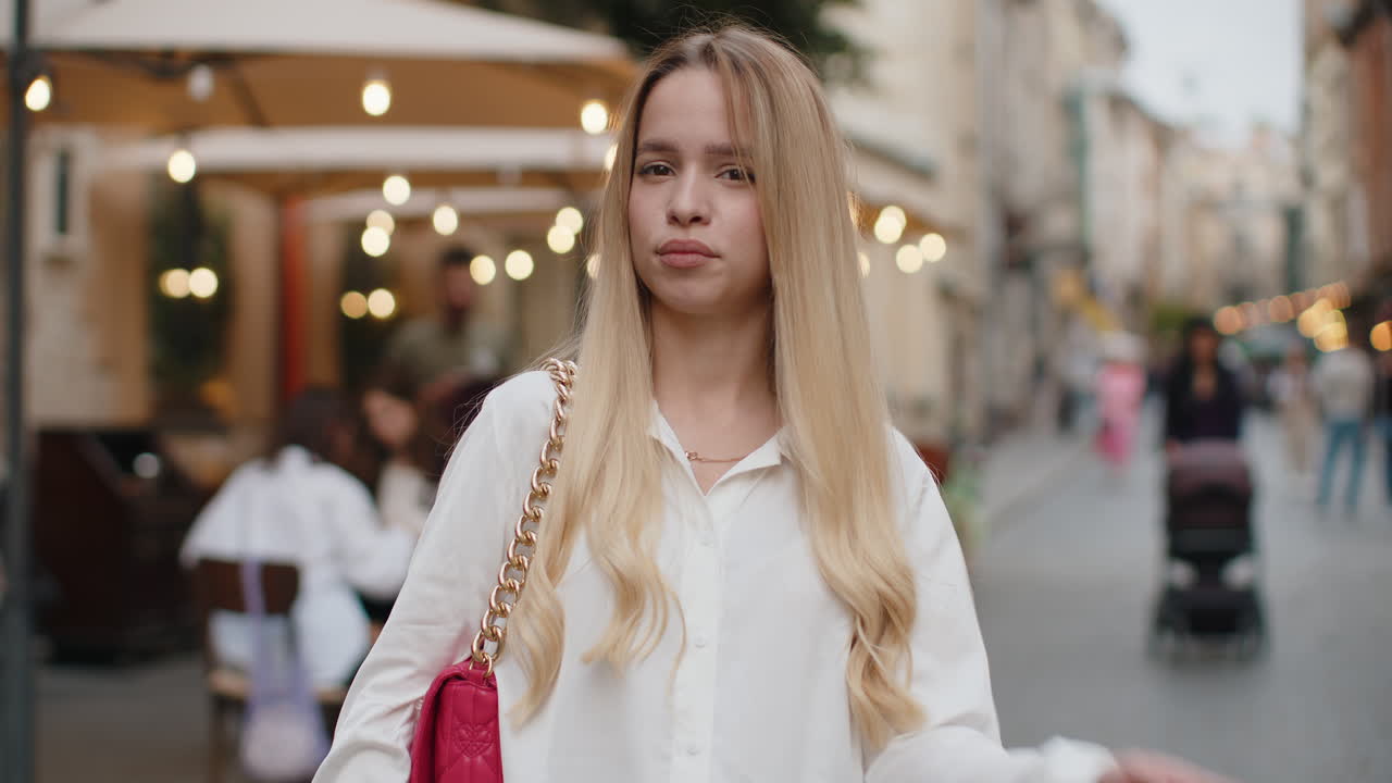 Displeased upset young woman girl reacting to unpleasant awful idea wave hand finger shake head no