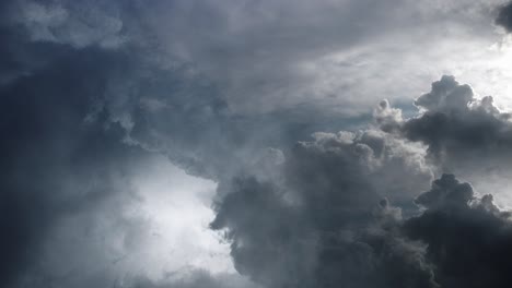 pov thunderstorm with cumulonimbus dark clouds moving in the sky