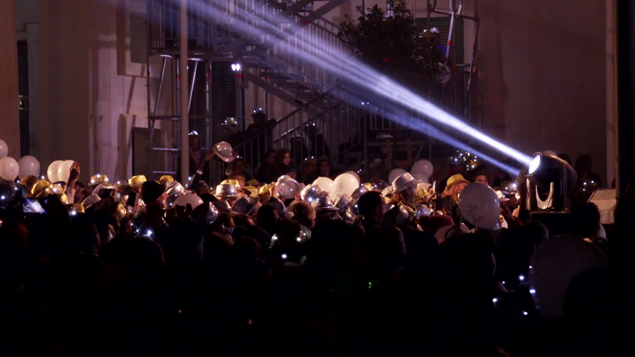 crowd of happy people under the stage during the New Year's Concert