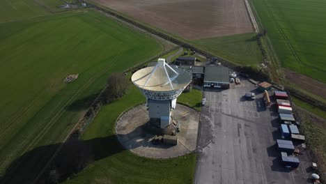 Top-down-aerial-birds-eye-view-shot-of-observatory-with-radar-antenna