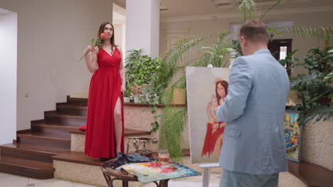 live model poses with grace for painter. woman stands in art studio with rose serving as muse for skilled painter meticulously captures essence on canvas