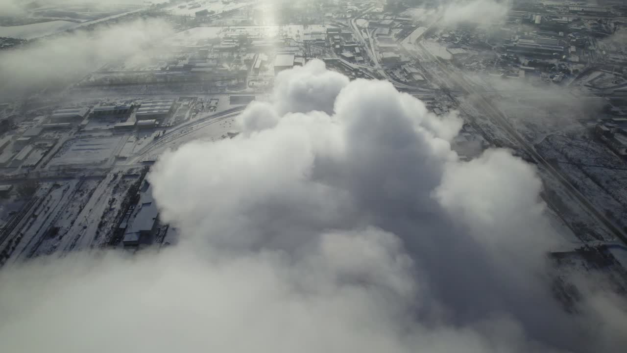 Industrial Area in Winter with Smoke and Fog
