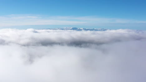 clouds-over-the-mountains-Puy-de-Sancy-Massif-Central-France-Auvergne-blue-sky