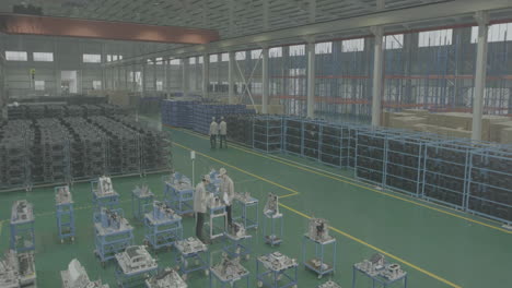 industrial professional technical mechanic holding tablet or clipboard, checking list inventory of car engine in warehouse logistic. man at work walking around automotive engine part factory
