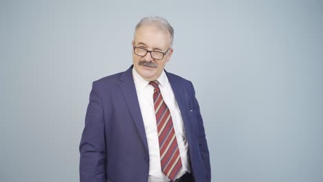 businessman winking at camera.