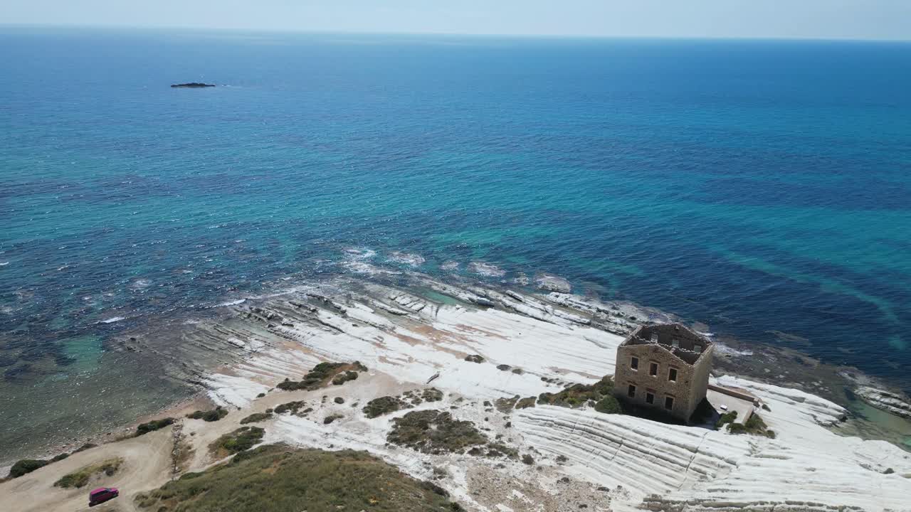 Aerial drone footage of Punta Bianca, Sicily: white limestone cliffs, turquoise sea, and untouched coastline. Perfect for travel, nature, and cinematic landscape projects