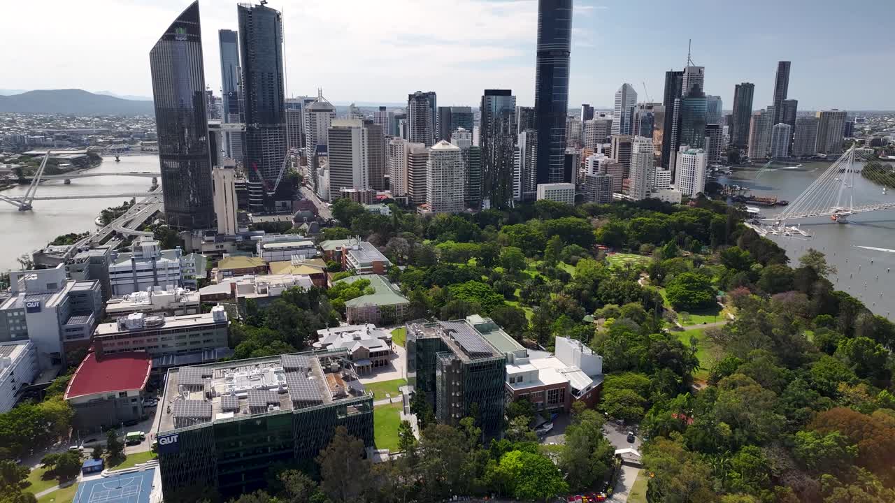 Brisbane aerial cityscape over City Botanic Gardens. Metropolitan city centre and river. Australia