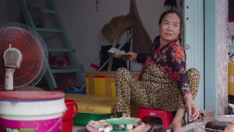 vietnamese fishmonger at a local market