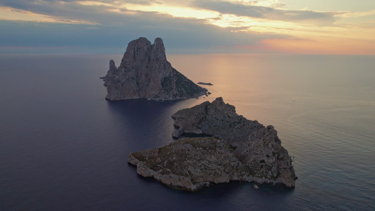 Scenic View Of Island Es Vedr&agrave; In Ibiza, Spain At Sunset - aerial shot