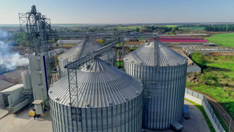 aerial view new grain elevator and a field in the foreground