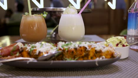 delicious indian food and drinks at a restaurant