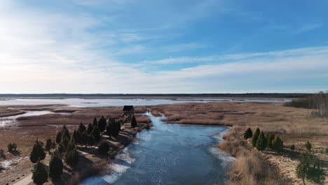 birdwatching tower of riekstusala at kaniera lake lapmezciems, latvia reed trail in kemeri national park fund with swamps and many tiny lakes