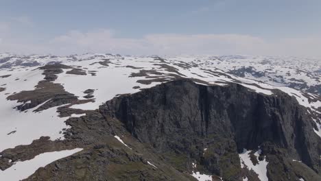 drone video of the melting snow in the mountains