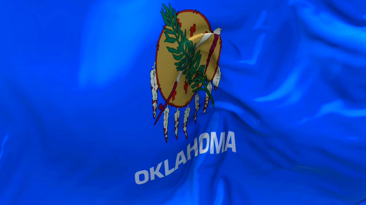 bandera de oklahoma ondeando en el viento animación en cámara lenta. 4k textura de tela realista bandera soplando suavemente en un día de viento fondo de bucle continuo sin costuras.