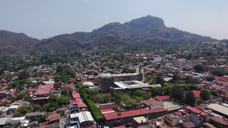 drone view of tepoztlán, morelos, looking backward