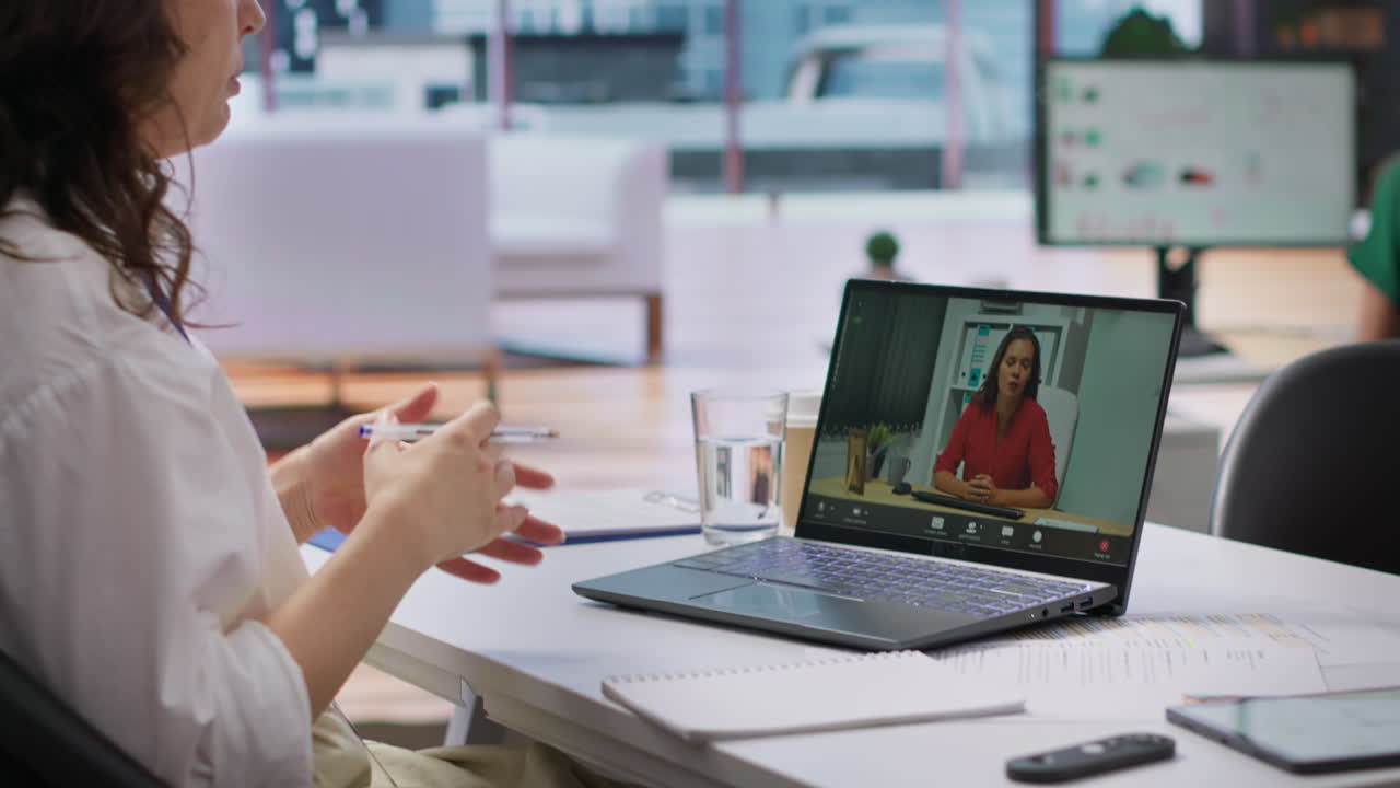 Human resources worker conducting a job interview via online videocall