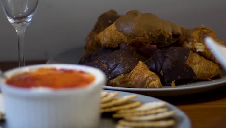 Close-up-focus-pull-shot-of-crackers-and-croissants