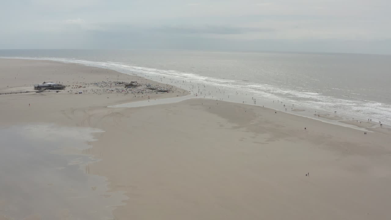 Drone - Aerial shot of the sandy beach of St. Peter Ording at the north sea, schleswig holstein, germany, 25p