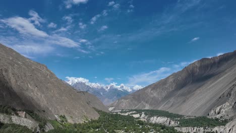 time lapse open valley of hunza peak with snow and clouds transition, pakistan trek