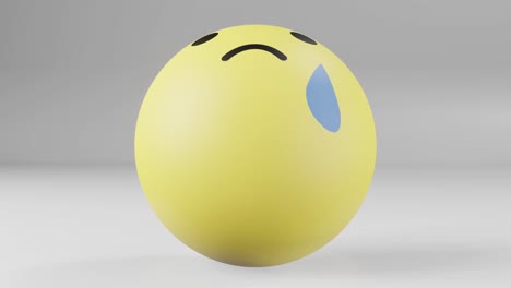 Sad-reaction-facebook-button-in-the-shape-of-giant-rubber-ball-rolling