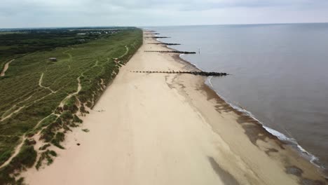 drone aerial view of the empty ocean shore beach without people during covid. climate change