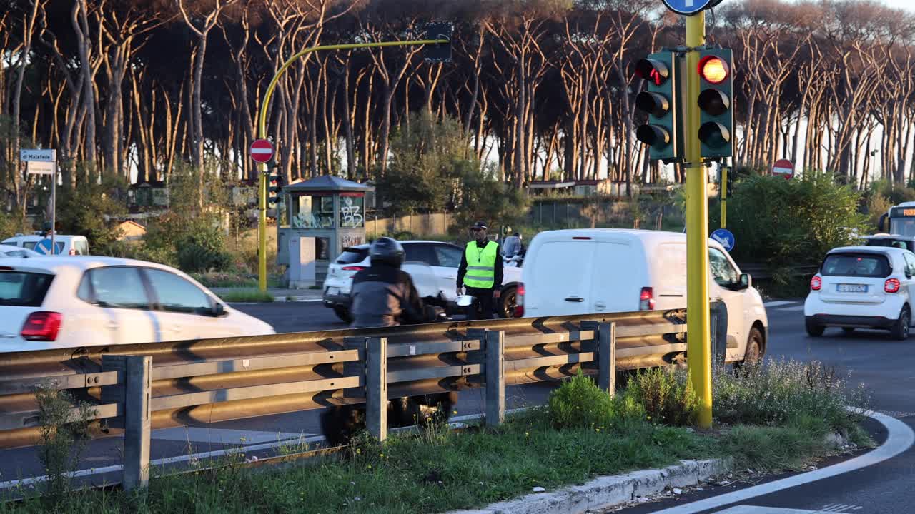 Police Officer Directing Traffic at Intersection