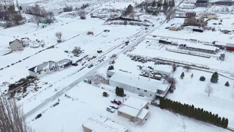 Drone-shot-of-rural-homes-mixed-with-farm-processing-facilities