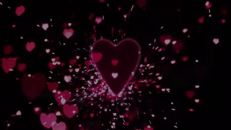 animación de corazones cayendo sobre un fondo negro