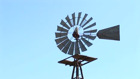 closeup of a windmill turning in the breeze