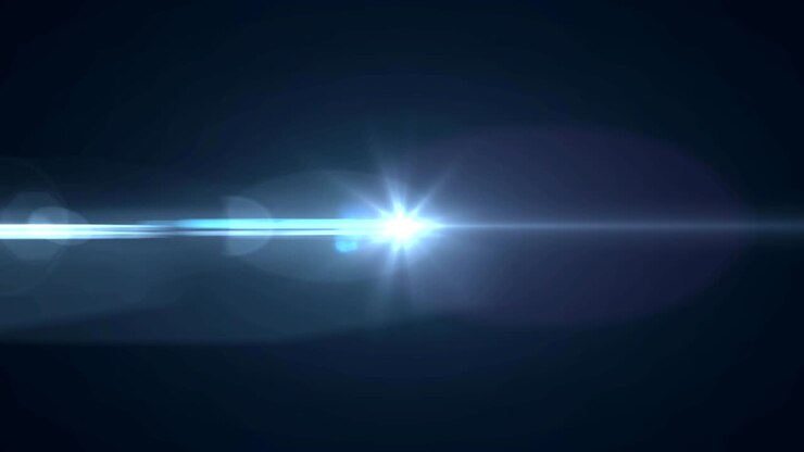 Punto di luce blu brillante che brilla su sfondo nero