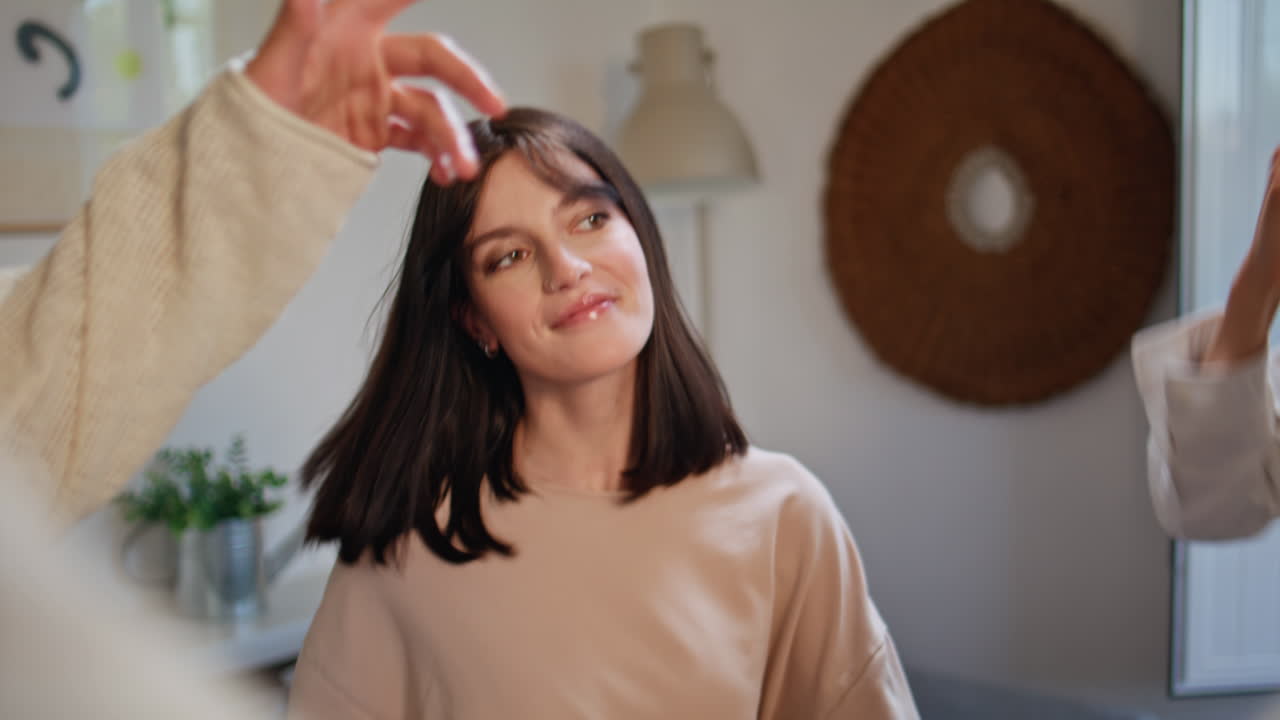 Closeup active brunette dancing apartment. Young woman moving by rhythmic music