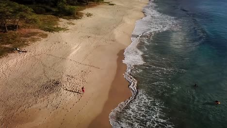 hawaii - running at the beach and following me with drone 3