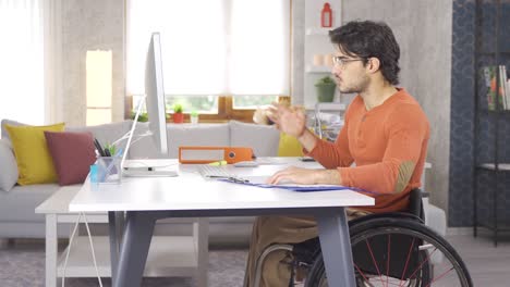 disabled young man studying.