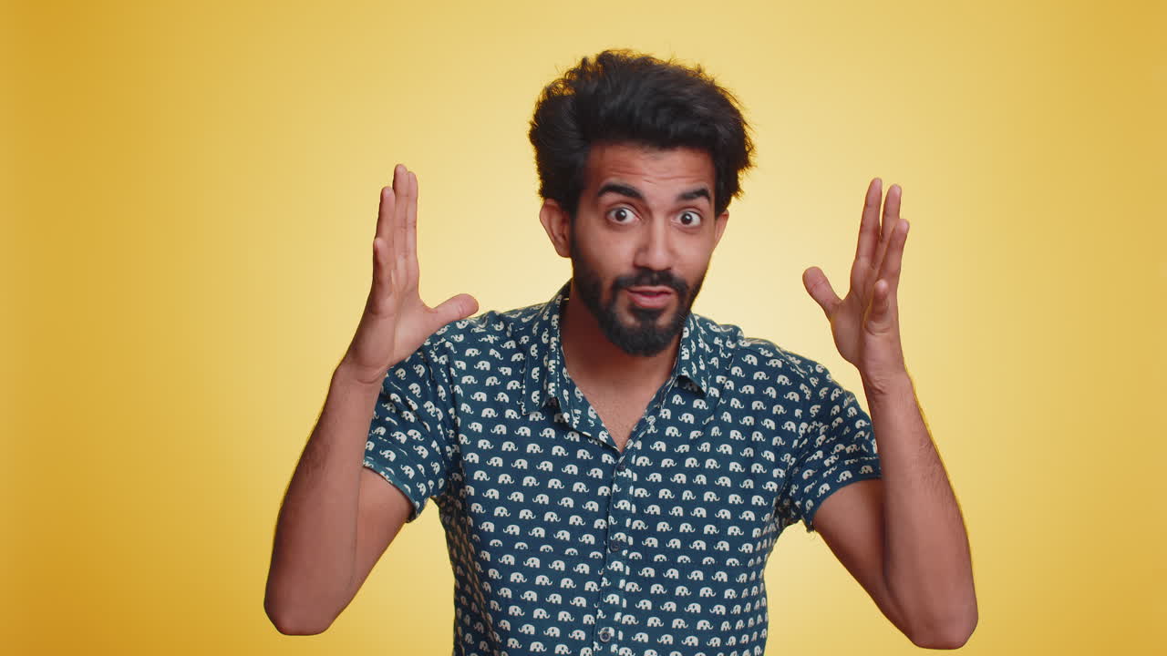 Excited amazed man showing head explosion looking worried shocked surprised guy wow idea eureka