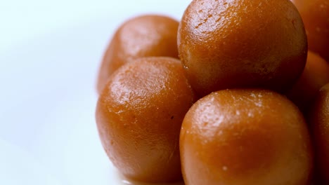 gulab jamun revolving ( indian sweet ) | dessert