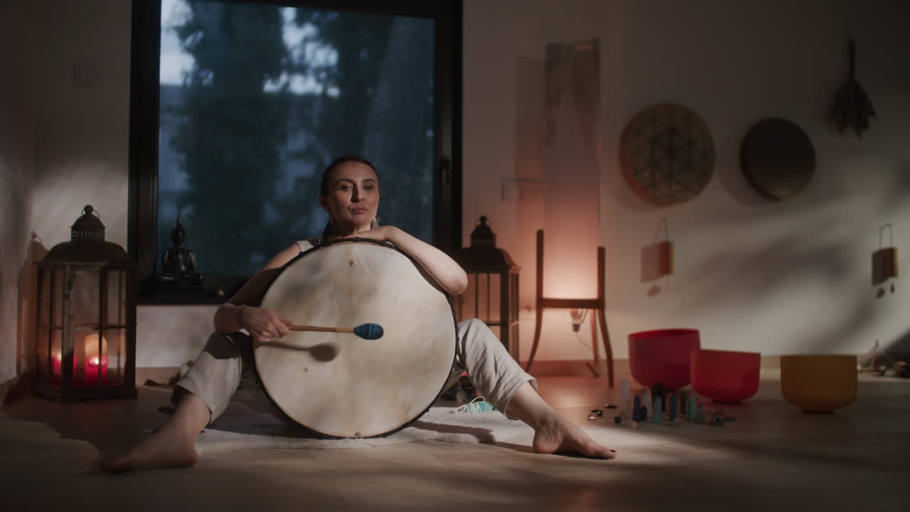 Woman Meditating and Drumming