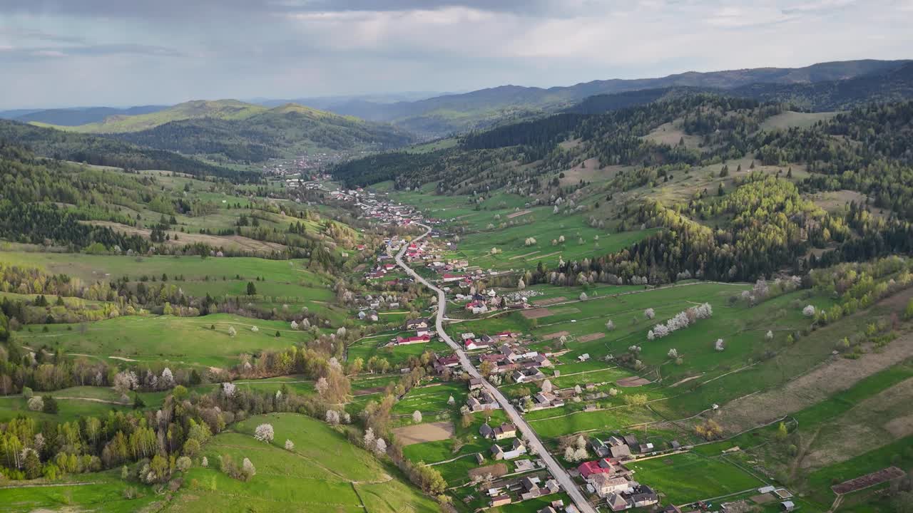 Drone video of Poiana Micului village and the hills around it