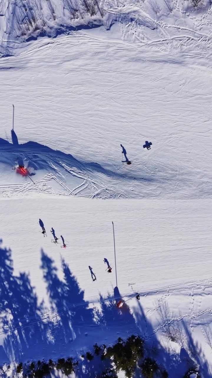 Visitors enjoy winter sports in the Carpathians mountains of Bulgaria